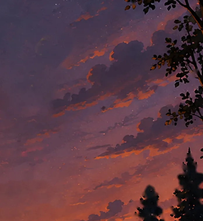 Clouds turning from gold to violet as the evening sky changes.